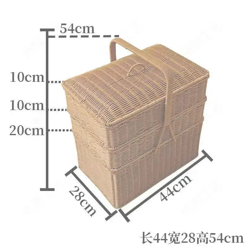 Beige handwoven rattan picnic basket with lid and handle rectangular for outdoor storage and use