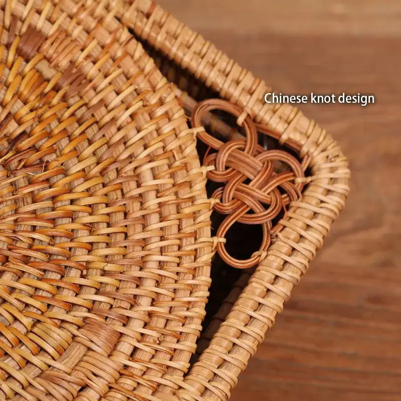 Handwoven rattan storage box by decorbites with natural tan woven basket and intricate chinese knot decor