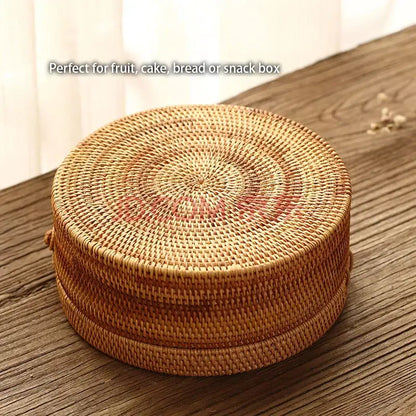 Round woven rattan storage box with natural tan color and white inset decorbites handwoven rattan basket