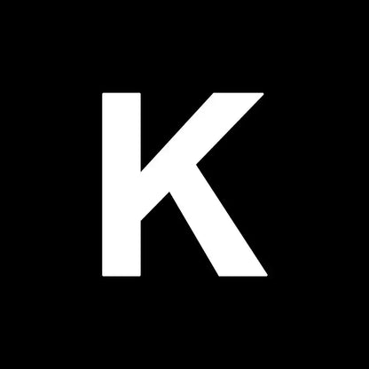 White uppercase letter k on a black background for decorbites heart cake mold in kitchen baking and decorating