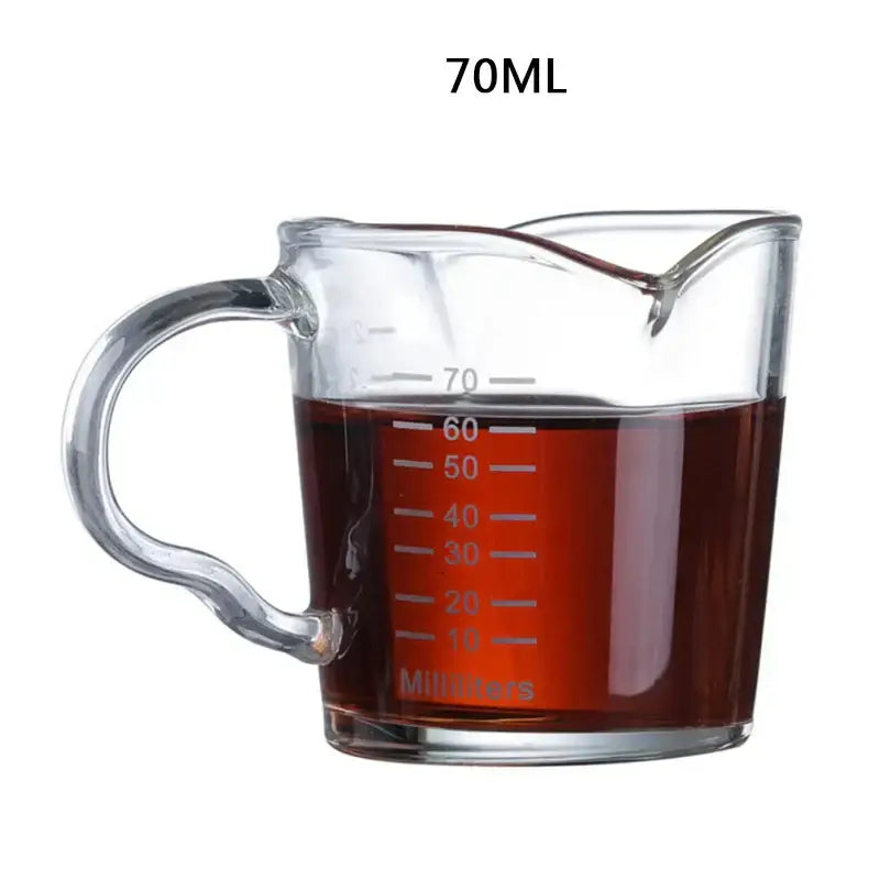 Heat resistant clear glass espresso milk jug with wood handle and 70ml measurement for kitchen use