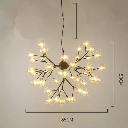 A modern black metal heracleum firefly chandelier with clear glass globe bulbs in a branching design for dining room decorbites heracleum firefly