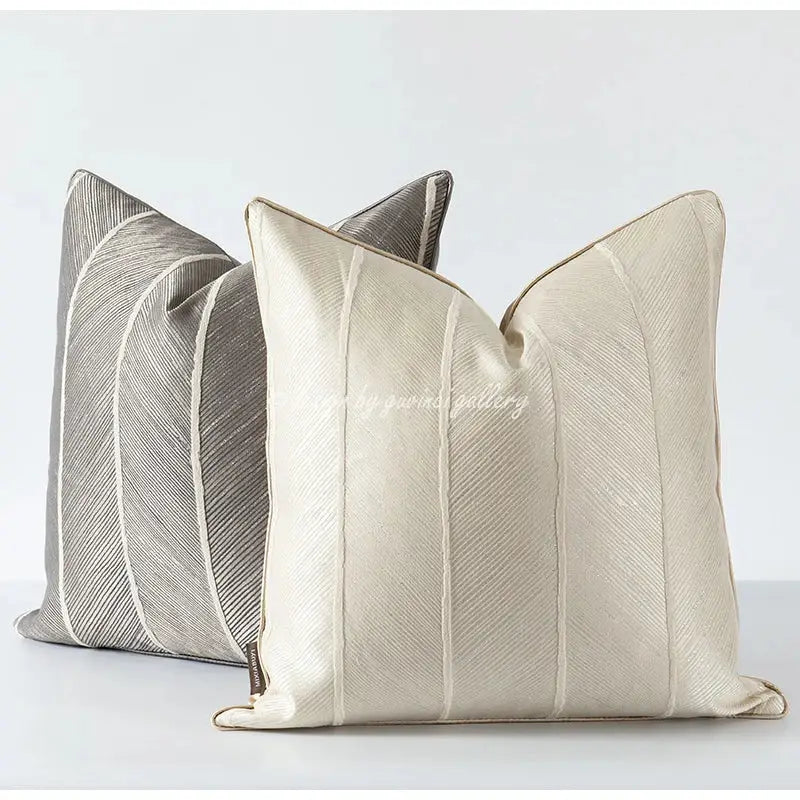 Cream-colored herringbone jacquard cushion cover with subtle diagonal ribbed texture and matching piping for living room decor