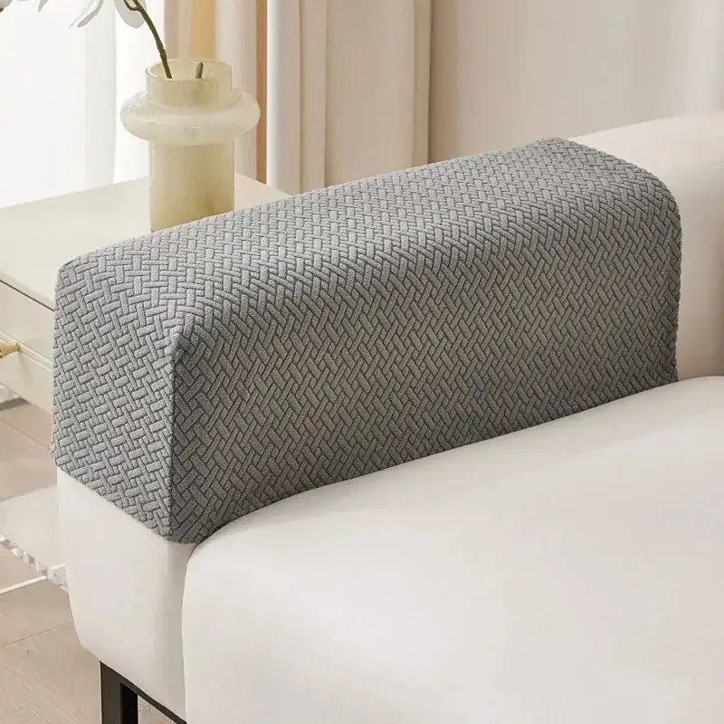 Gray textured fleece backrest cover with woven herringbone pattern for living room sofa armrest protection back view
