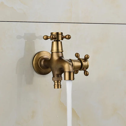 Antique brass outdoor washing machine faucet with dual handles and spigot for garden and bathroom use