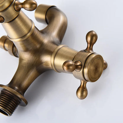 Antique brass-finished three-handle total brass bathroom faucet with ornate knobs for washing machine and garden use