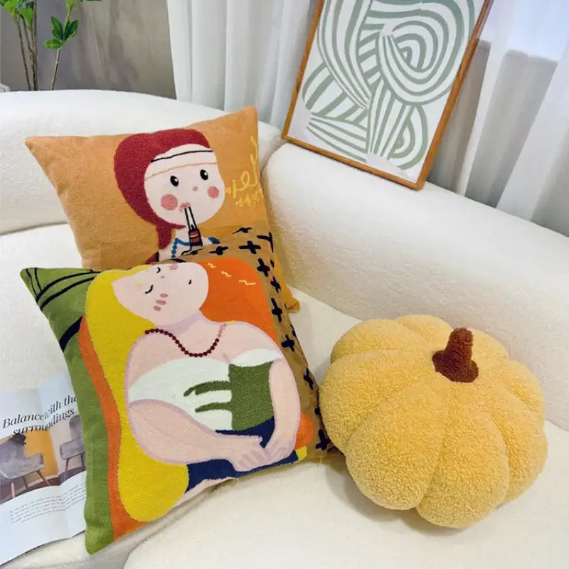 Yellow plush pumpkin-shaped throw pillow with brown stem featuring cartoon oil painting embroidery decorbites cartoon oil decor