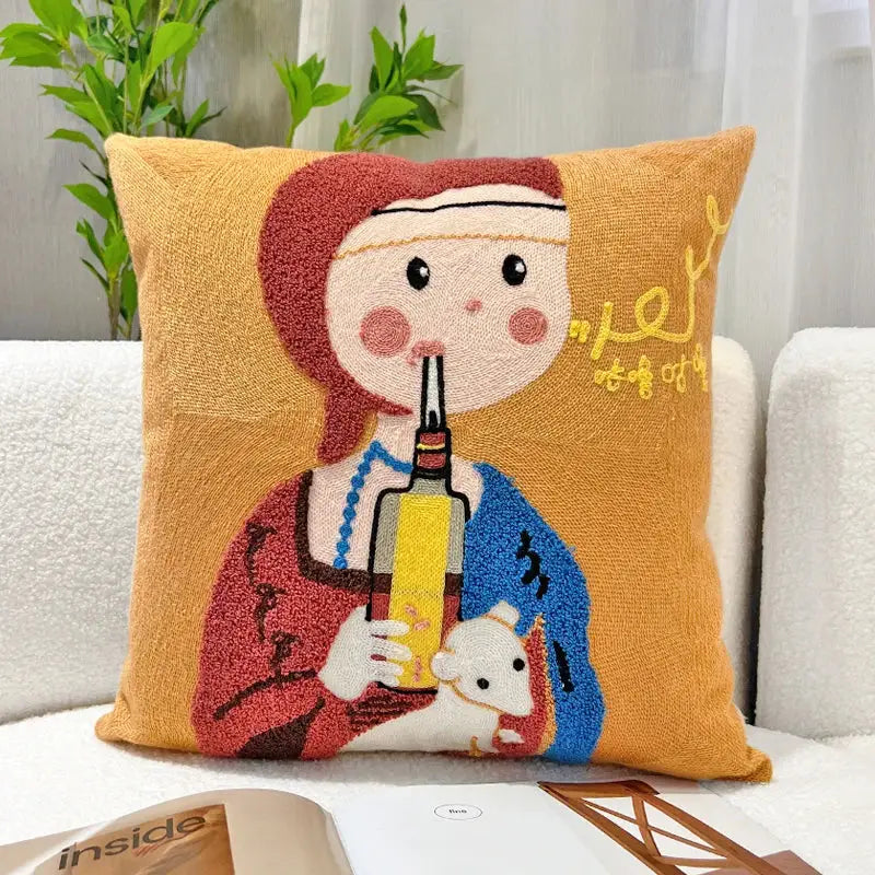 Orange cushion featuring colorful cartoon oil painting embroidery of a red-haired girl holding a bottle with a white mouse
