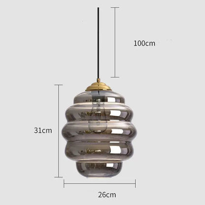 Honeycomb amber blue and gray glass pendant light with tiered smoked glass and brass accents for kitchen dining decorbites colorful glass