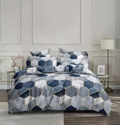 Blue and gray hexagonal patterned bedding set with gold trim from decorbites honeycomb marble collection