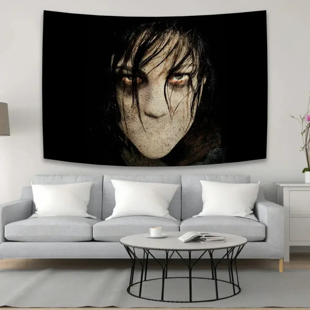 Black tapestry featuring a haunting horror movie character with pale face glowing eyes for decorbites horror movie decor
