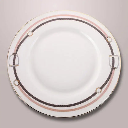 White ceramic plate with gold rim and black horsebit handles featuring pink and brown stripes from decorbites bone china tableware set