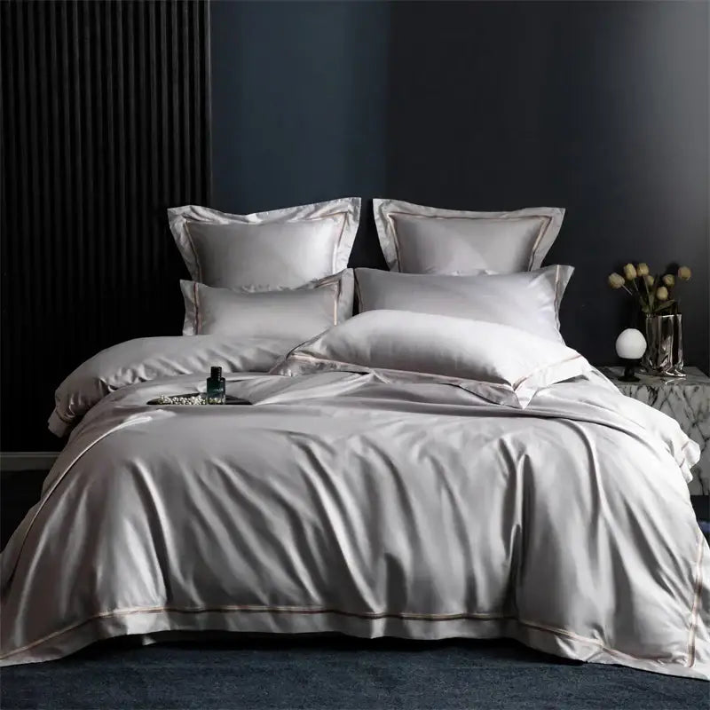 Silver satin bedding set with subtle gold trim from decorbites 1000tc egyptian cotton hotel style collection