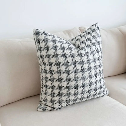 A cozy black and white houndstooth crochet cushion cover made from soft textured fabric for living room decorbites decor