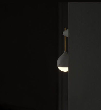 White ceramic teardrop-shaped induction night light with gold accents for corridor bathroom bedroom use