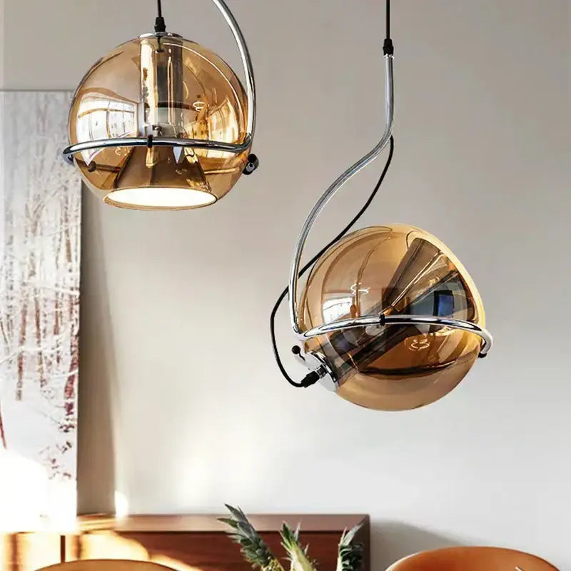 Two hanging spherical pendant lights with amber glass and chrome frames for decorbites industrial amber kitchen chandelier