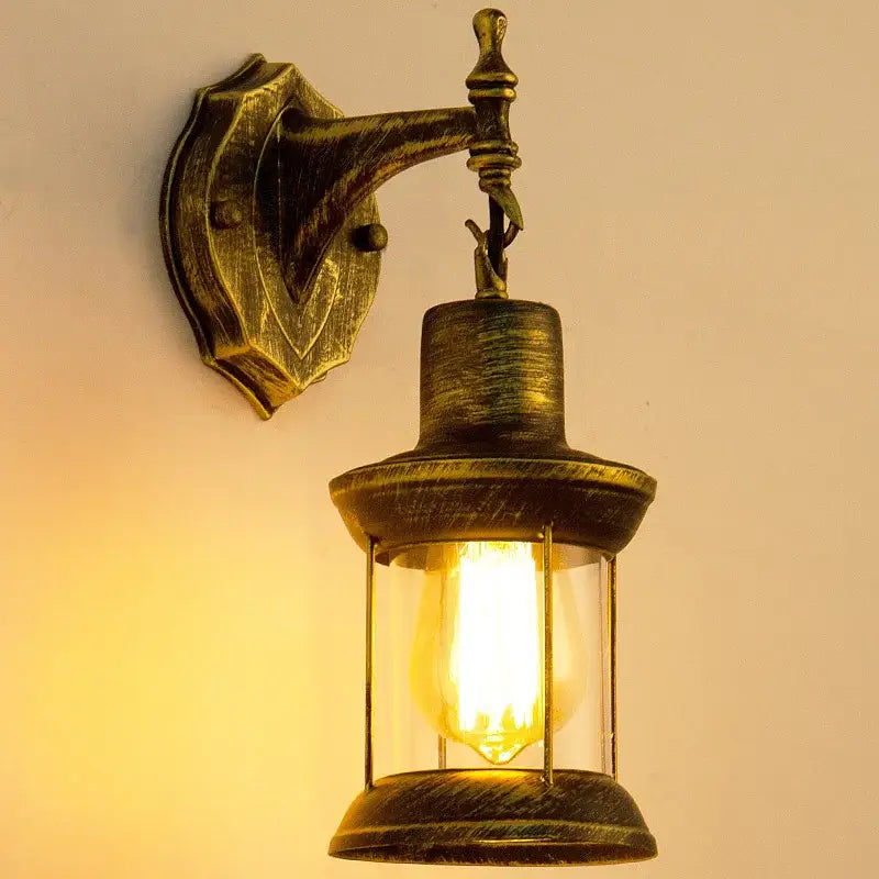 Antique brass wall lamp with clear glass and exposed filament bulb by decorbites industrial glass wall sconce