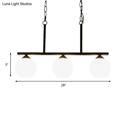 Black metal bar pendant light with three opal glass globe shades ideal for dining rooms by DecorBites™