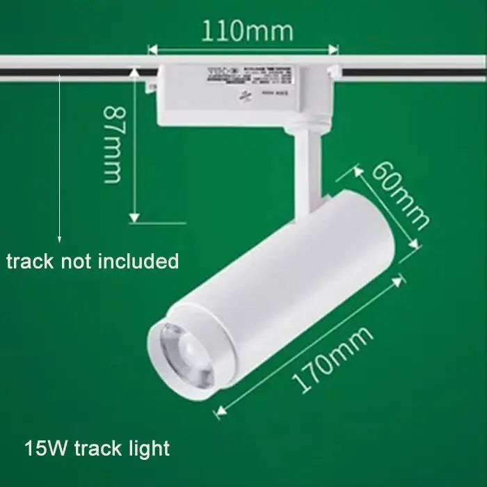 White cylindrical 15w track spotlight with adjustable focus and sleek mounting bracket for decorbites adjustable focus use
