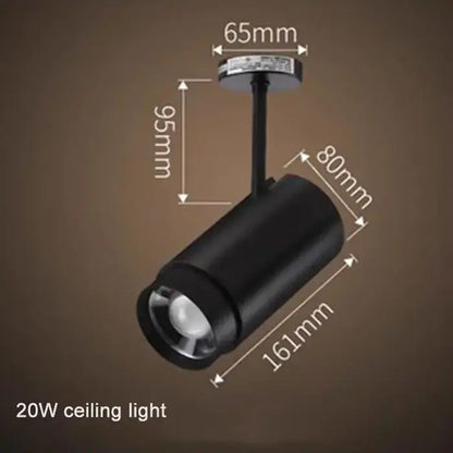 Black cylindrical 20w ceiling track spotlight with adjustable focus and matte finish by decorbites for living room lighting