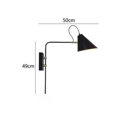 Industrial black and brass swing arm wall light with a conical shade and articulated arm by decorbites industrial vintage