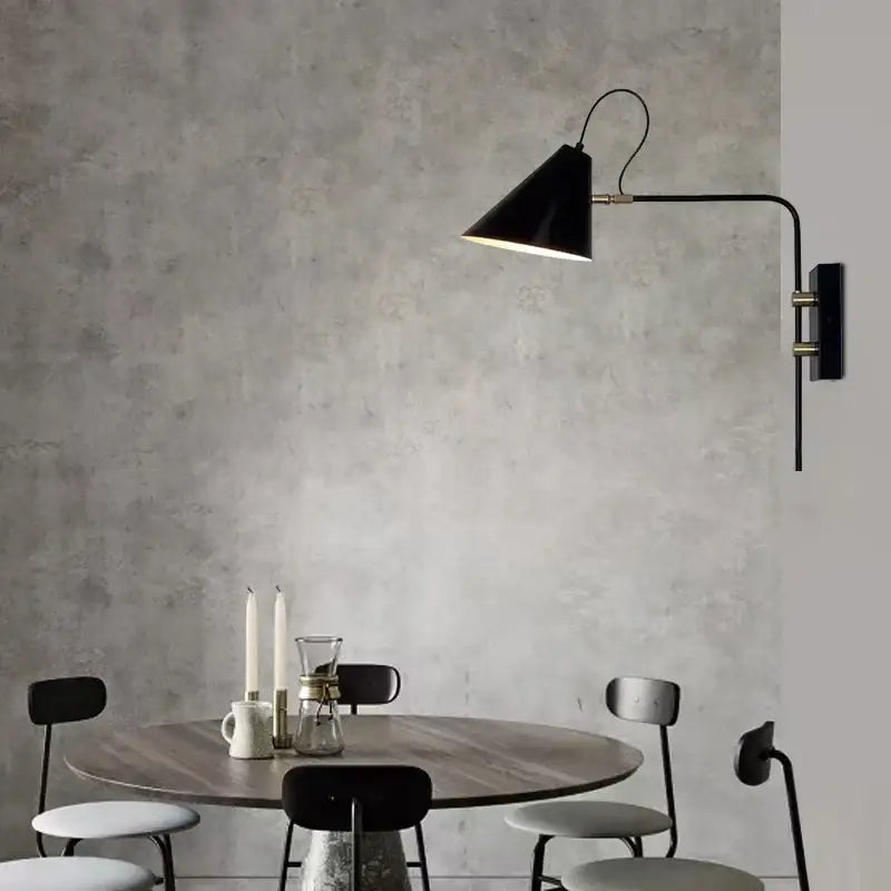 Black conical swing arm wall light with brass accents industrial vintage decorbites for living room decor