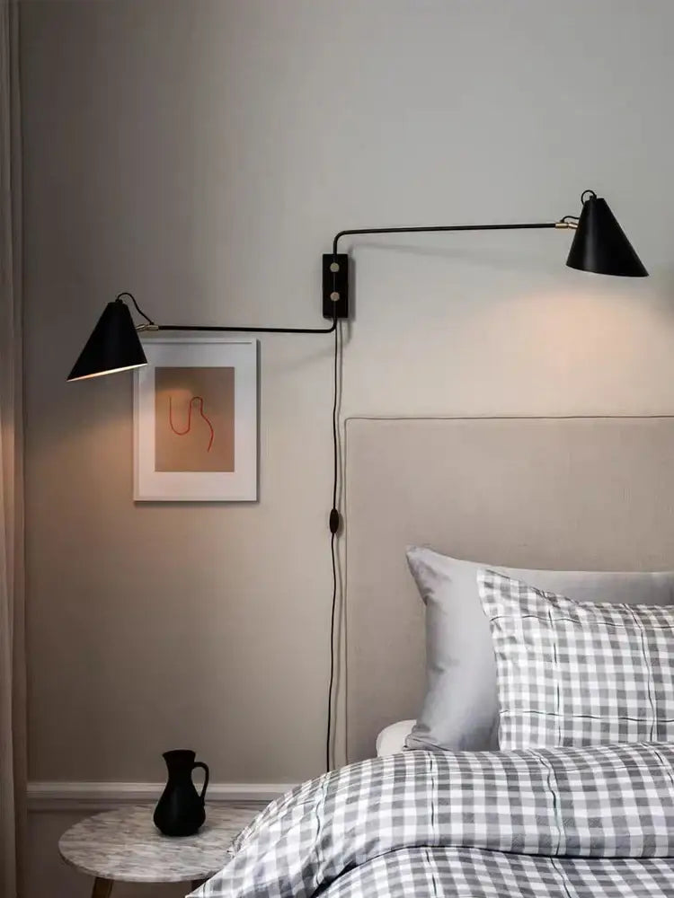 Black conical wall light with brass swing arm and switch perfect for decorbites industrial vintage living room decor