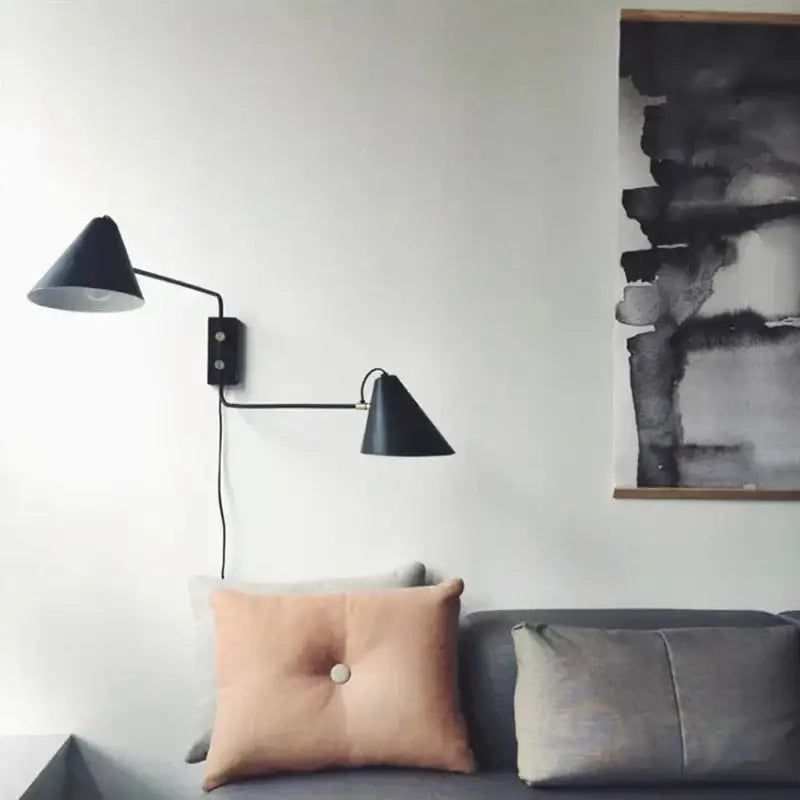 Black conical wall light with two adjustable swing arm in matte finish for decorbites industrial vintage living room decor