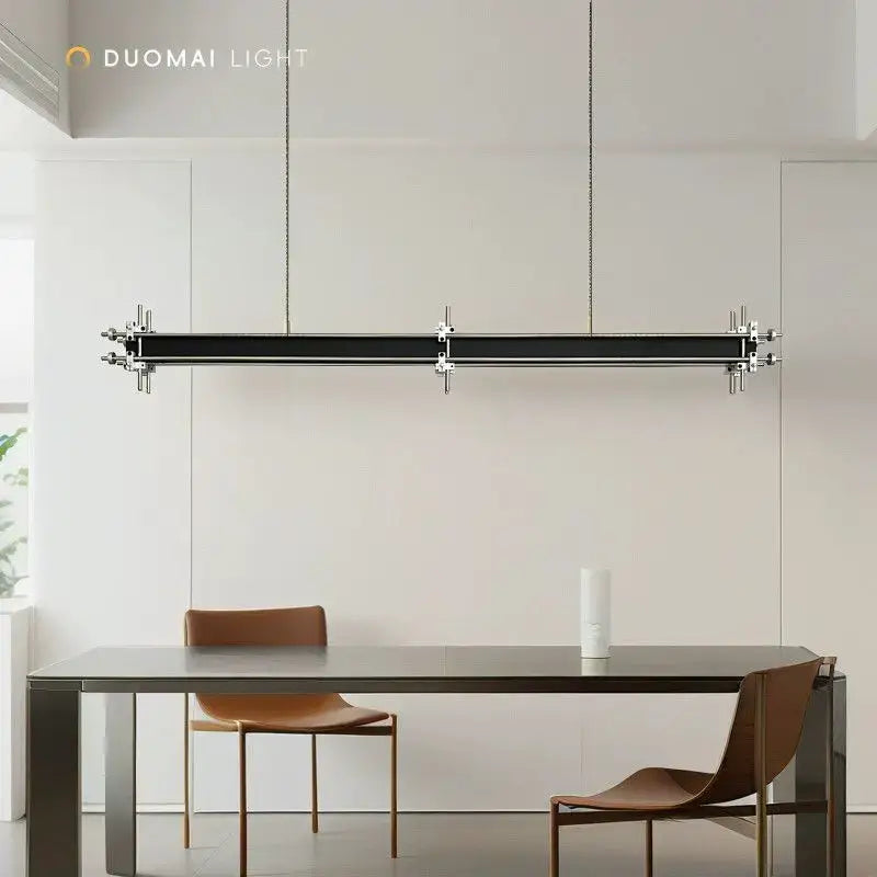 Modern black linear pendant chandelier with chrome hardware and chain suspension for dining room decorbites industrial style