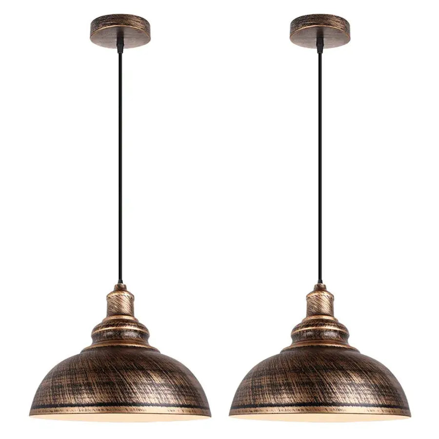 Pair of vintage-style bronze pendant lights with textured distressed metal shades and black cords for industrial loft decorbites industrial loft iron dining room