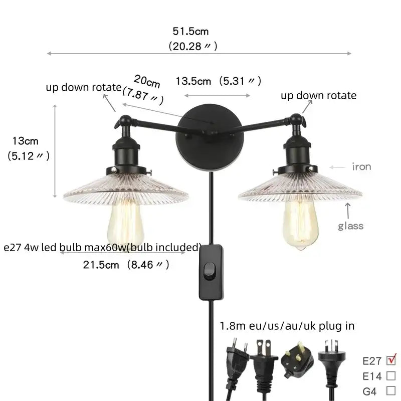 Black iron industrial wall light fixture with two adjustable arms and exposed edison bulbs for bedroom sconce use