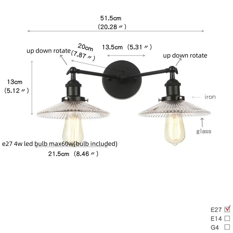 Industrial black iron wall light fixture with two adjustable arms and clear glass shades for bedroom sconce use