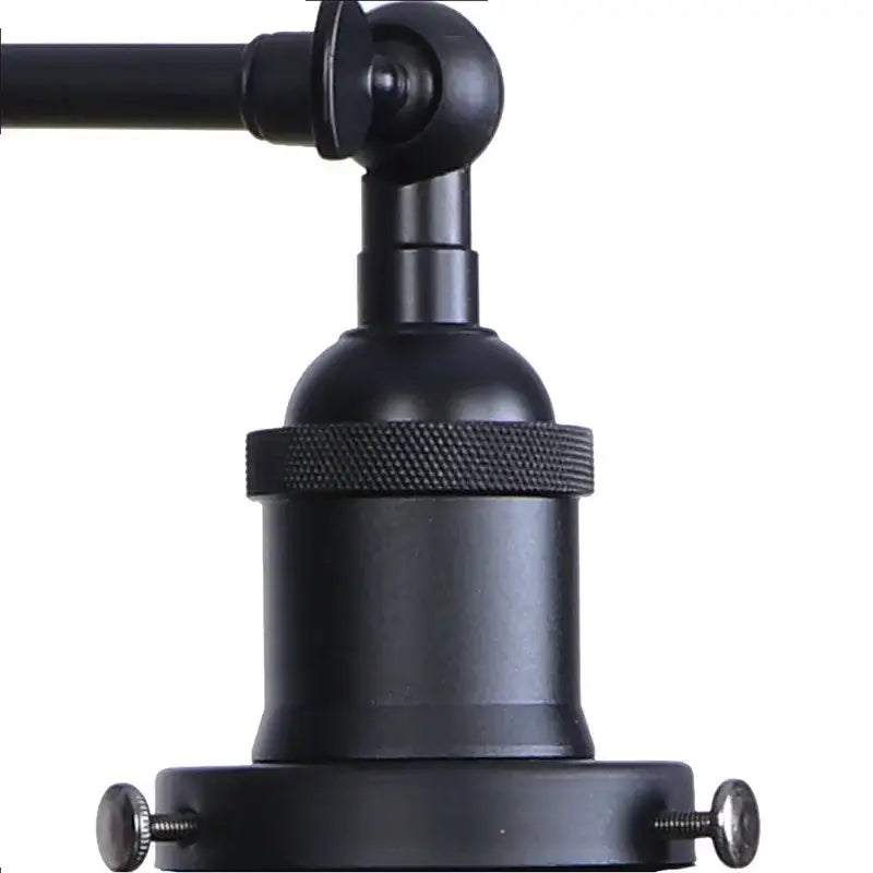 Industrial black and white wall light fixture with black matte metal and textured knurled ring adjustable arm wall light