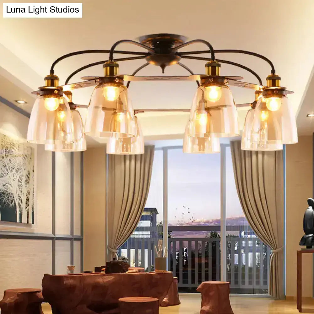 Antique brass ceiling lamp with six warm-toned cognac glass bell light fixtures perfect for living room decor