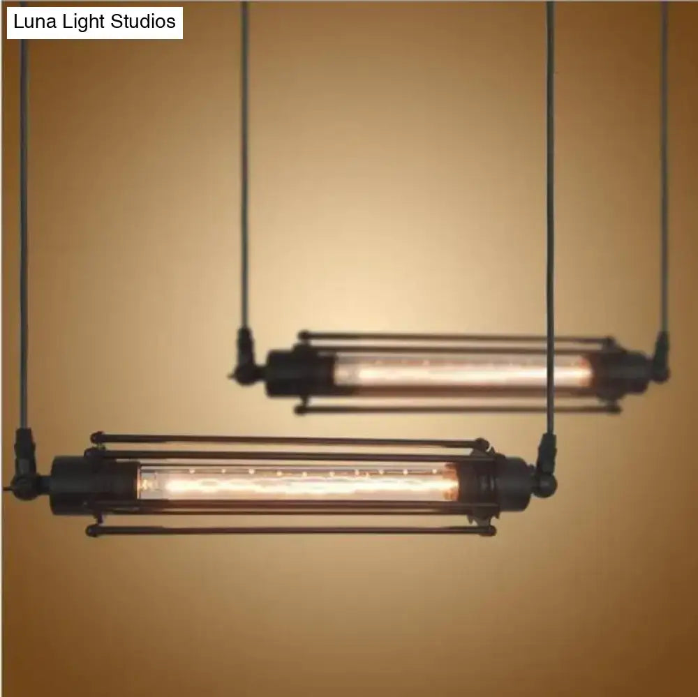 Industrial black and brass flute pendant light with exposed filament bulbs perfect as a vintage flute pendant light for kitchen island