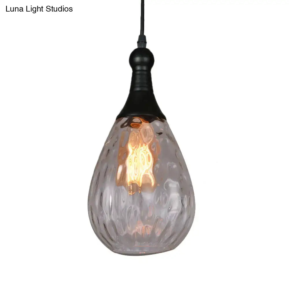 A teardrop-shaped glass ceiling light with textured translucent surface and industrial black brass fixture by decorbites daisy industrial black