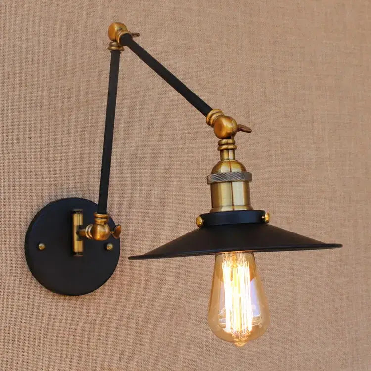 Industrial black and brass swing arm wall lamp with exposed edison bulb and black metal arm for bedroom decorbites industrial swing decor