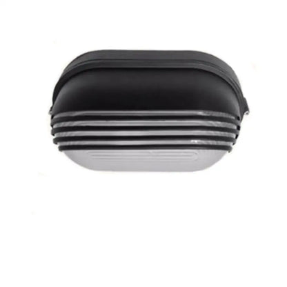 Industrial black bulkhead wall light with oval textured ribbed design and frosted glass diffuser for outdoor use