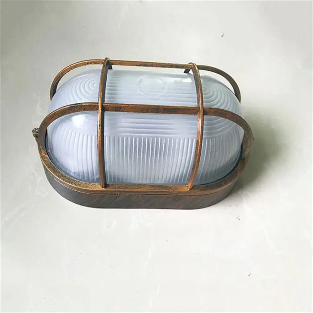 Vintage-style decorbites black bulkhead wall light with frosted glass diffuser and rusted metal cage for patio security