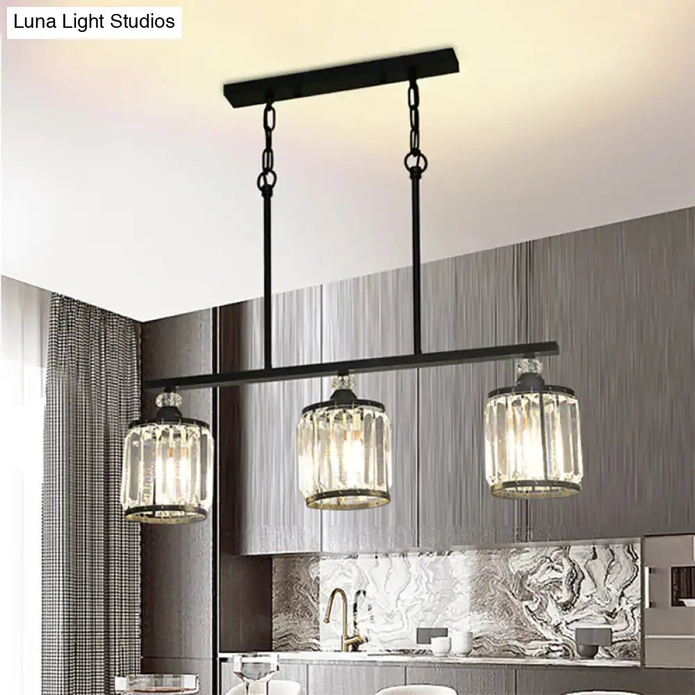 Black metal pendant light with three clear crystal cone cylinder shades for industrial dining room lighting