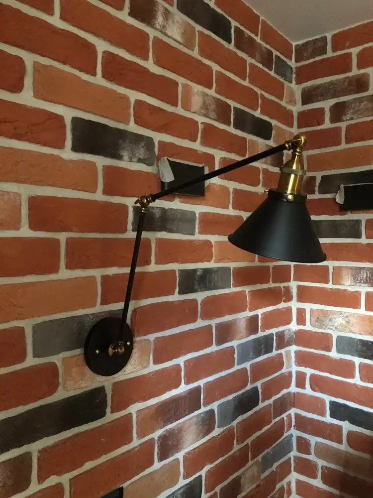 Industrial black copper vintage wall sconce with brass conical shade and long arm perfect for bedroom decorbites black copper