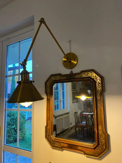 Brass adjustable wall sconce with conical shade in black copper vintage style decorbites black copper bedroom light