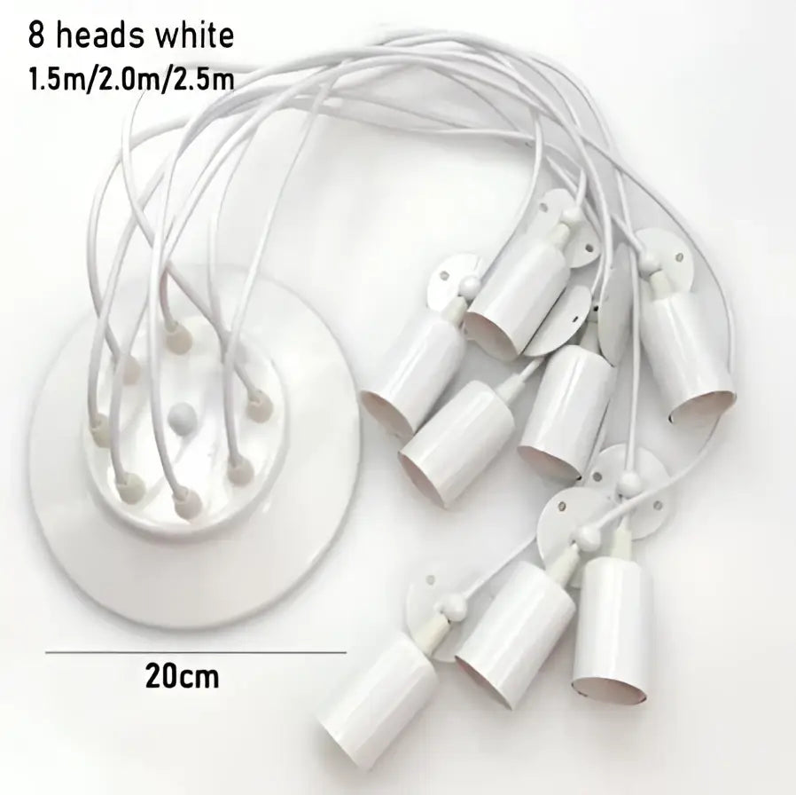 White plastic ceiling pendant light fixture with eight cylindrical light sources and circular mounting base, no black finish