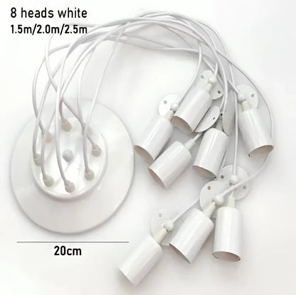 White plastic ceiling pendant light fixture with eight cylindrical light sources and circular mounting base, no black finish