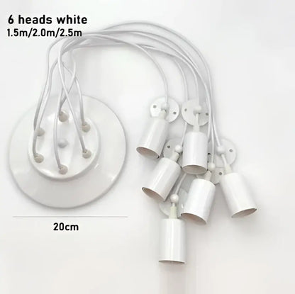 White plastic ceiling pendant light with six cylindrical lamp holders and circular base in black finish for dining room