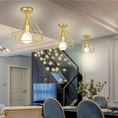 Gold geometric cage pendant light with exposed bulbs featuring decorbites industrial led design for dining room decor
