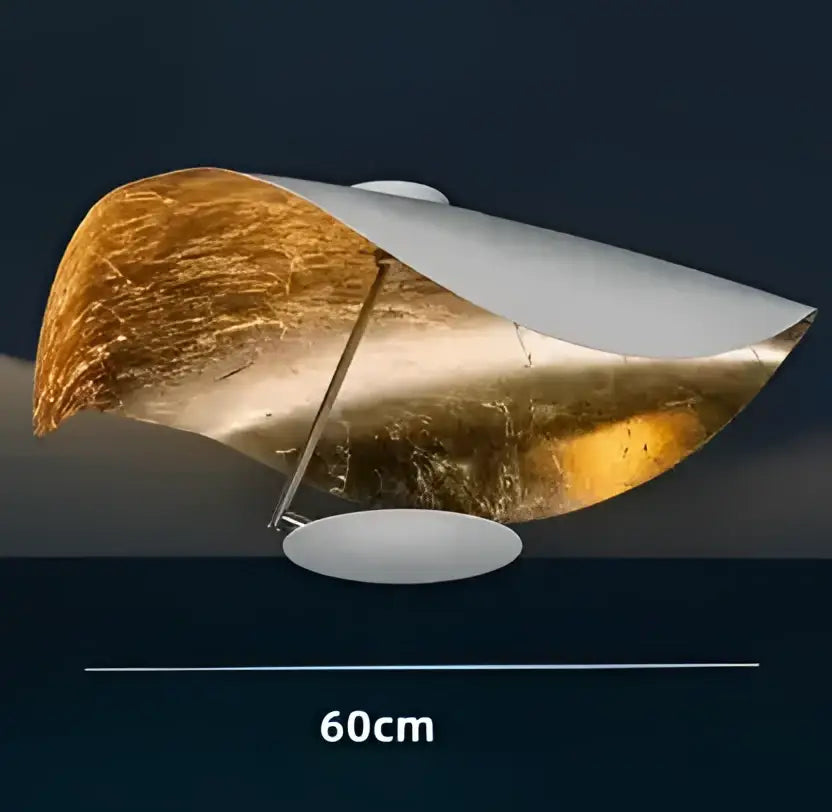 A sleek decorbites lederam manta pendant light with curved metallic gold and white finish for dining room decor
