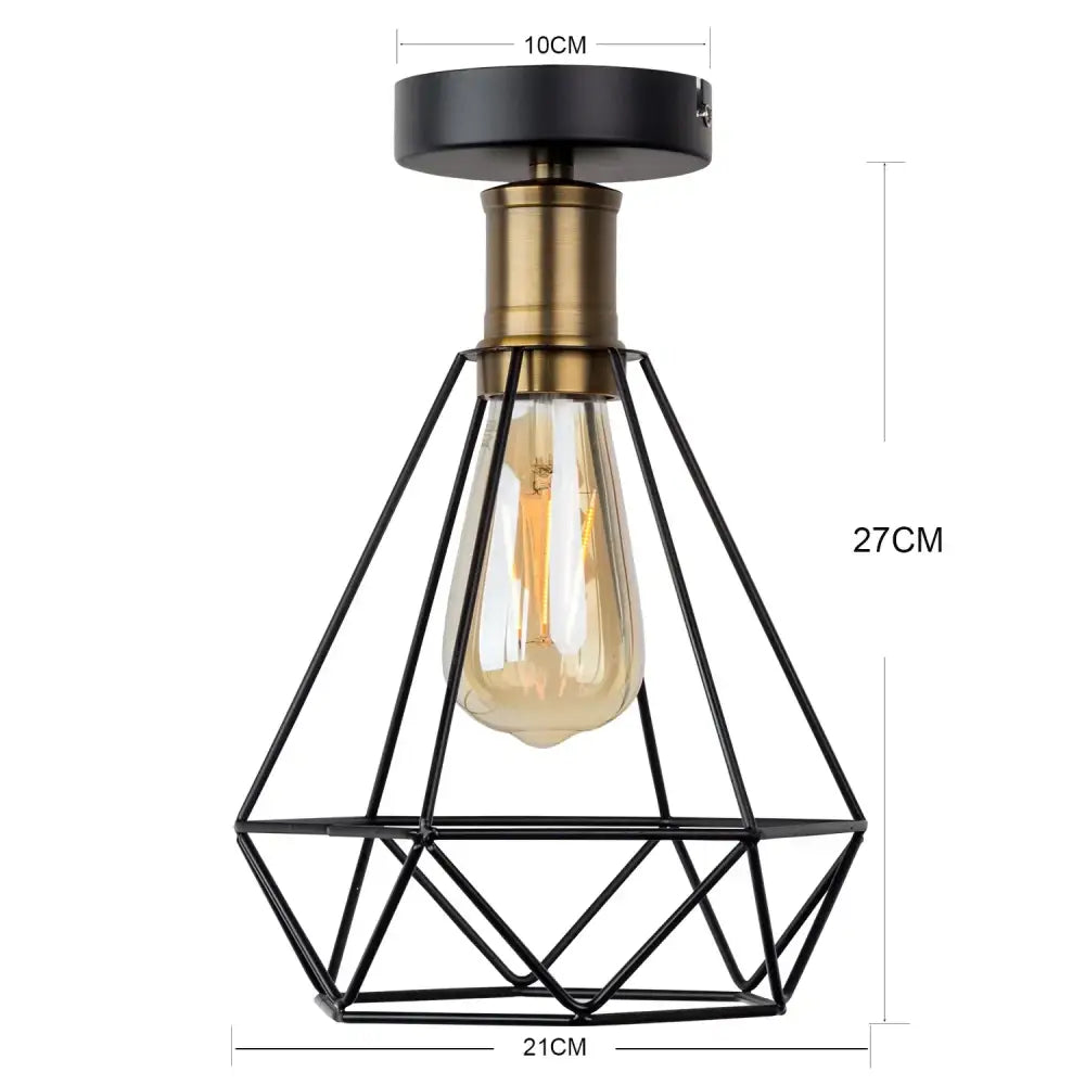 Industrial black iron cage ceiling light with brass stem and amber glass bulb decorbites iron cage led pendant for dining room