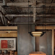 Decorbites rustic black tube pendant ceiling light with iron frame and exposed filament bulb for restaurant or island lighting