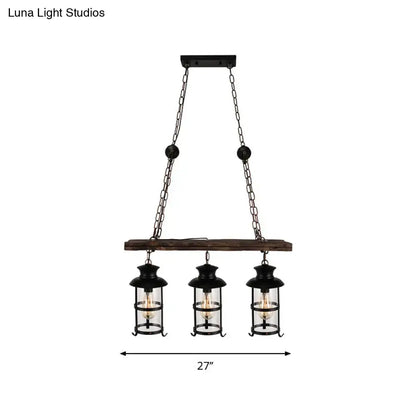 Black metal pendant light with three clear glass bulbs, rustic wooden beam, and cage design by DecorBites™